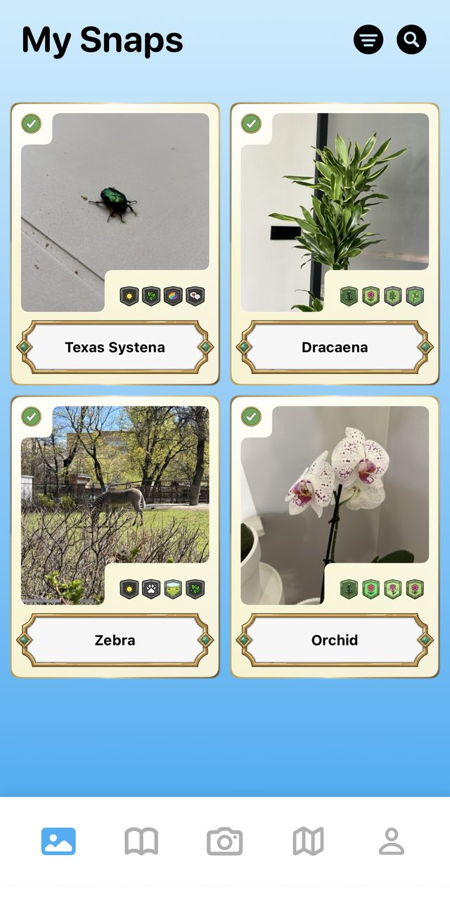Snappit My Snaps screen showing a collection of identified plants and animals
